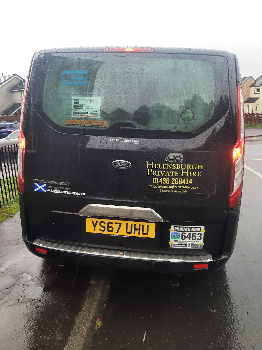 Trident Taxis branded Ford minibus, back doors